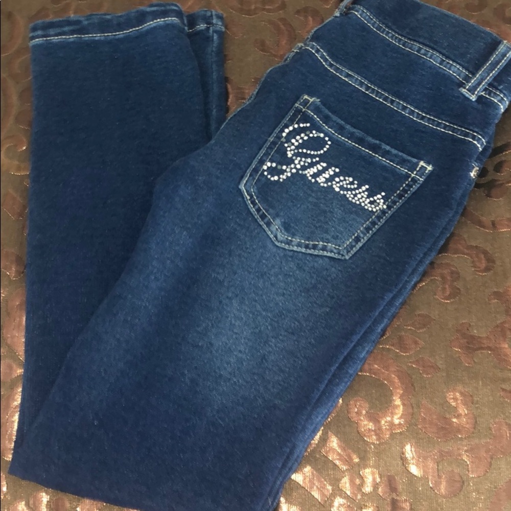 Never worn distress look jeggings by Guess